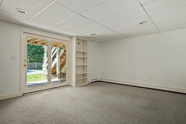 12 Coombs Cir, Newburyport, MA 01950 - spare room featuring a drop ceiling, carpet floors, and baseboard heating