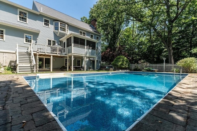 12 Coombs Cir, Newburyport, MA 01950 - view of swimming pool featuring stairway, a deck, and a sunroom