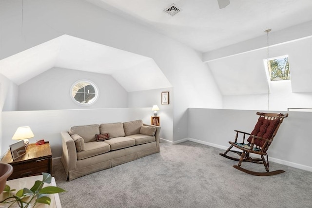 living room featuring lofted ceiling with beams and light carpet