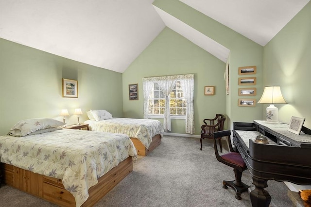 carpeted bedroom with vaulted ceiling