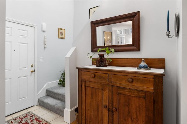 foyer with light tile patterned floors