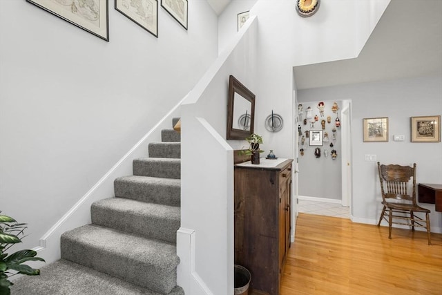 stairway with wood-type flooring