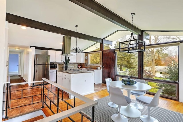 622 Pike Ave, Attleboro, MA 02703 - interior space with a chandelier, vaulted ceiling with beams, and light wood-style floors