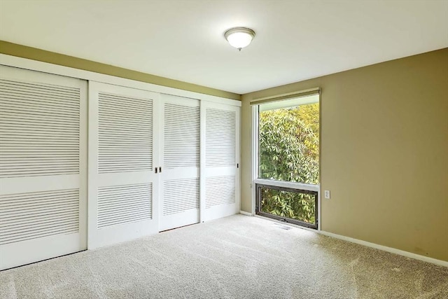 622 Pike Ave, Attleboro, MA 02703 - unfurnished bedroom with carpet flooring, baseboards, and a closet