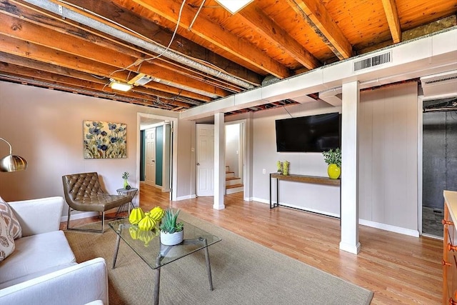 622 Pike Ave, Attleboro, MA 02703 - living room featuring baseboards, visible vents, light wood-type flooring, and stairs