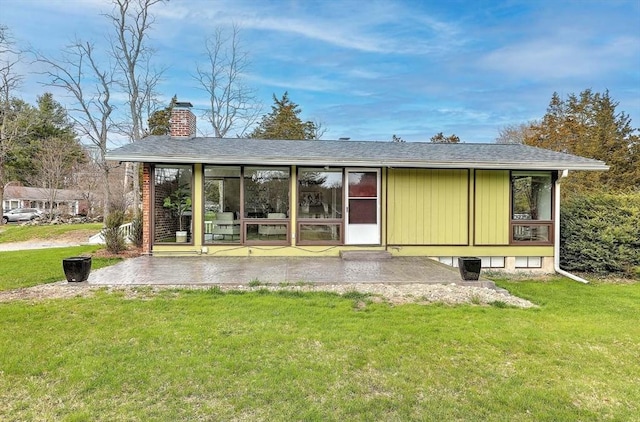 622 Pike Ave, Attleboro, MA 02703 - rear view of property with a chimney, a shingled roof, a yard, and a patio area