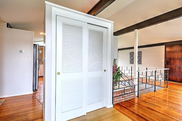 622 Pike Ave, Attleboro, MA 02703 - hallway featuring beamed ceiling, wood finished floors, and baseboards