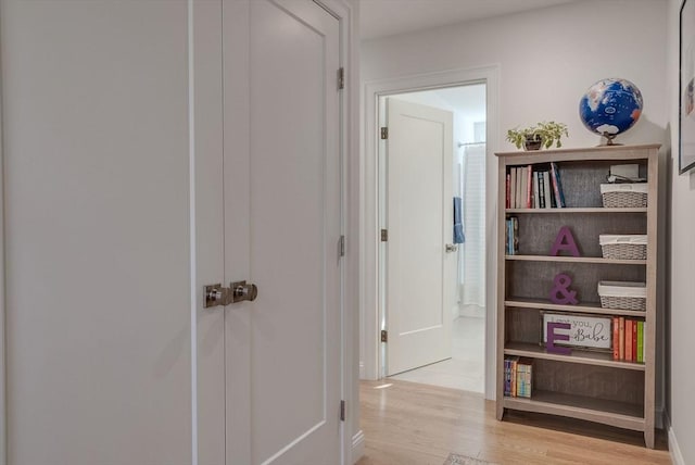 hall featuring light wood finished floors