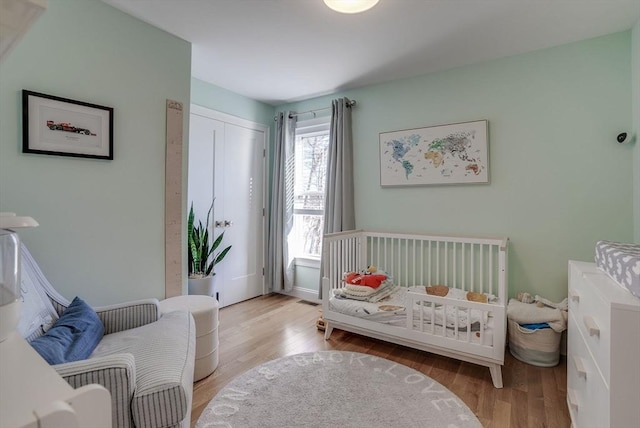 bedroom featuring light wood-type flooring