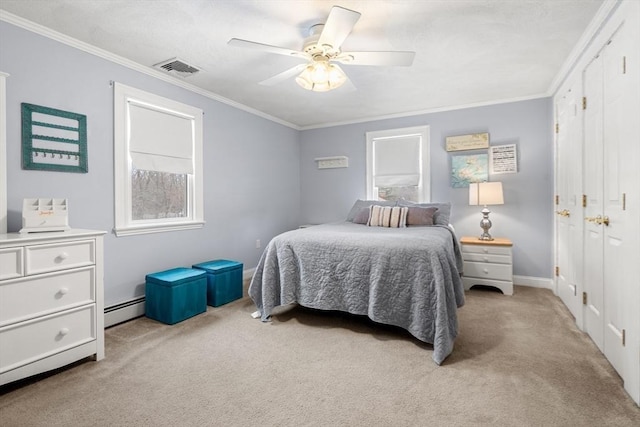 bedroom with a baseboard radiator, light colored carpet, visible vents, a closet, and crown molding