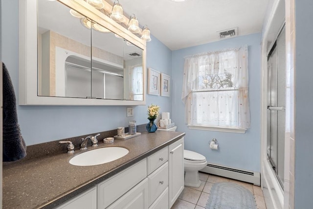 full bathroom featuring visible vents, toilet, baseboard heating, vanity, and tile patterned flooring