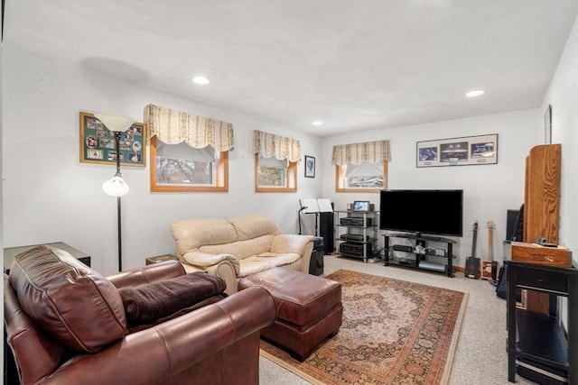 living room with recessed lighting and light colored carpet