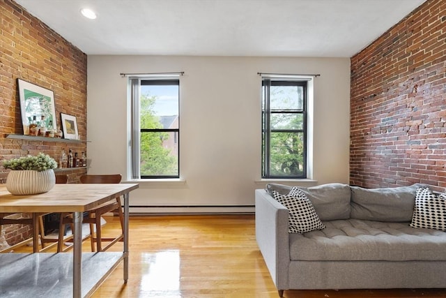 17 Dwight Unit 3, Boston, MA 02118 - living room with brick wall, healthy amount of natural light, light wood-type flooring, a baseboard radiator, and recessed lighting