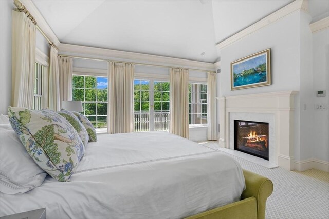 26 Longmeadow Dr, Westwood, MA 02090 - carpeted bedroom with lofted ceiling, a high end fireplace, and access to outside