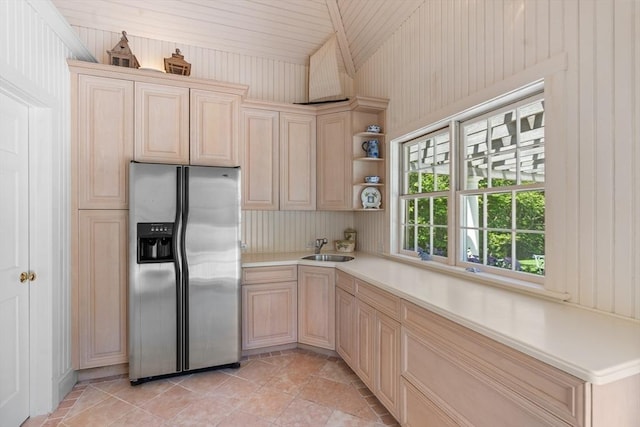 26 Longmeadow Dr, Westwood, MA 02090 - kitchen with stainless steel refrigerator with ice dispenser, light brown cabinetry, light countertops, lofted ceiling, and wood walls