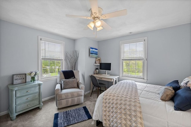 bedroom with baseboards, carpet flooring, and ceiling fan