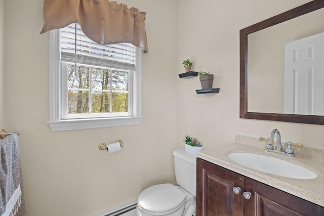 half bath featuring toilet and vanity