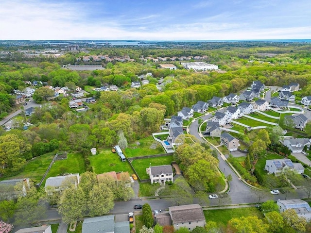 aerial view of property's location with nearby suburban area