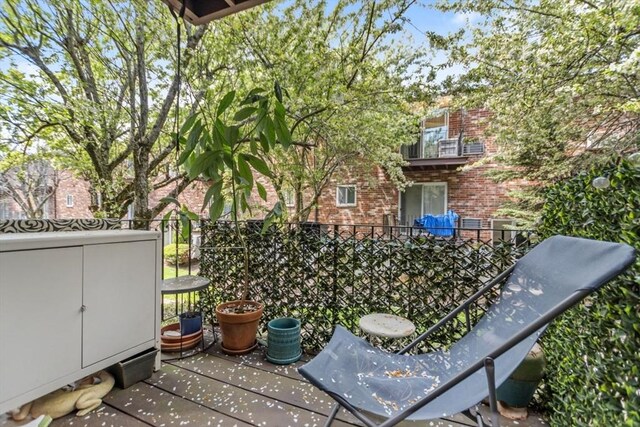 view of patio featuring fence
