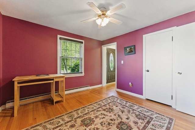 31 Fallston St, Springfield, MA 01119 - foyer with wood finished floors, ceiling fan, baseboards, and baseboard heating