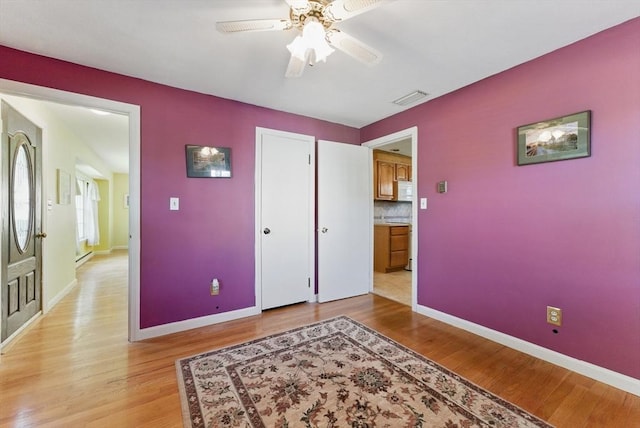 31 Fallston St, Springfield, MA 01119 - bedroom with light wood-style flooring, baseboards, a ceiling fan, and a closet