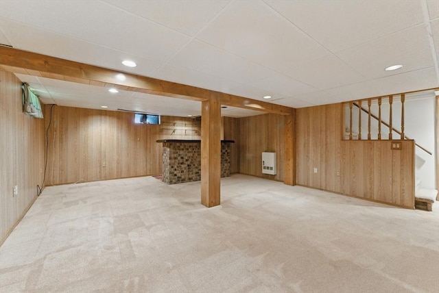 31 Fallston St, Springfield, MA 01119 - finished below grade area featuring wooden walls, carpet floors, stairs, a paneled ceiling, and heating unit