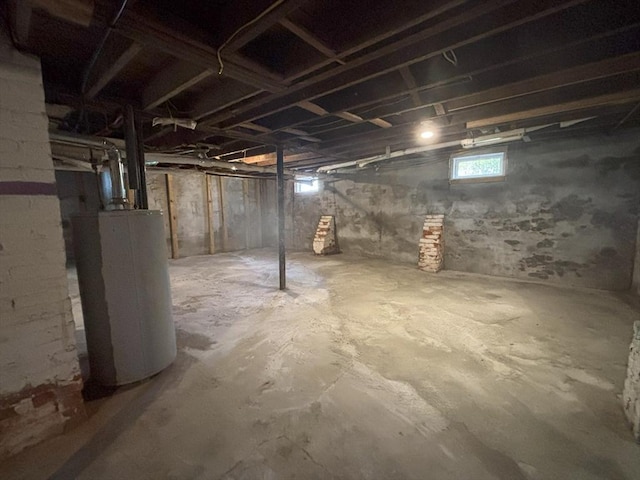 723 White St, Springfield, MA 01108 - basement featuring water heater