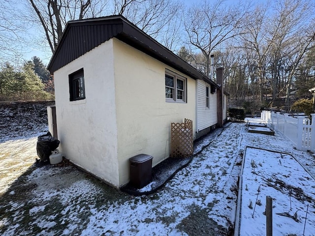 view of snow covered exterior