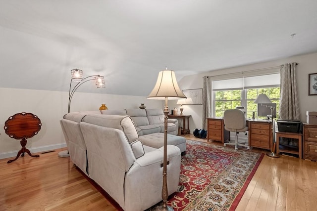 31 Shaker Hill Rd Unit 31, Hooksett, NH 03106 - living room with light wood-style flooring, vaulted ceiling, and a desk