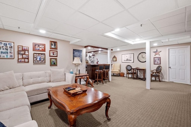 31 Shaker Hill Rd Unit 31, Hooksett, NH 03106 - living area with a bar, light colored carpet, and a paneled ceiling