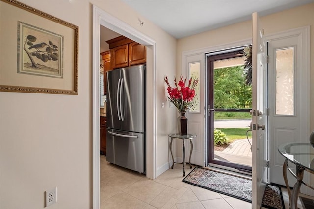 31 Shaker Hill Rd Unit 31, Hooksett, NH 03106 - doorway to outside with light tile patterned floors and baseboards