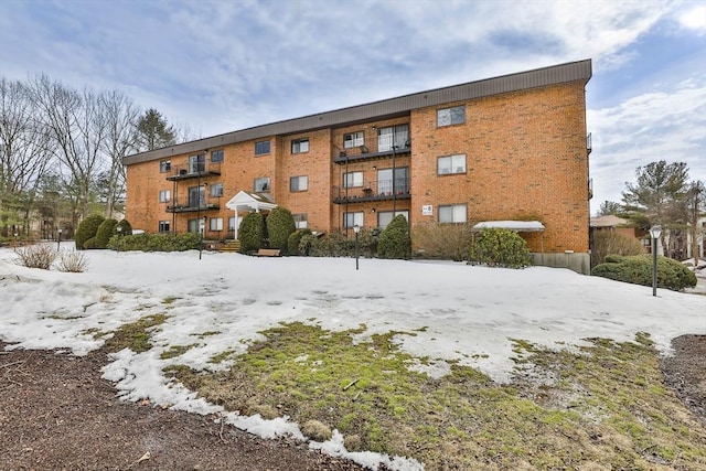 view of snow covered property