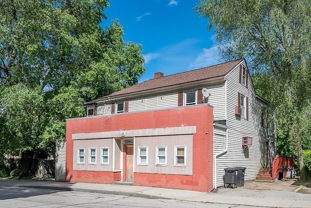 135 Elm St, Southbridge, MA 01550 - view of front of property featuring a chimney and brick siding
