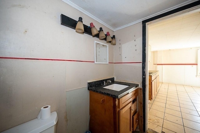 135 Elm St, Southbridge, MA 01550 - bathroom featuring vanity, ornamental molding, and tile patterned flooring