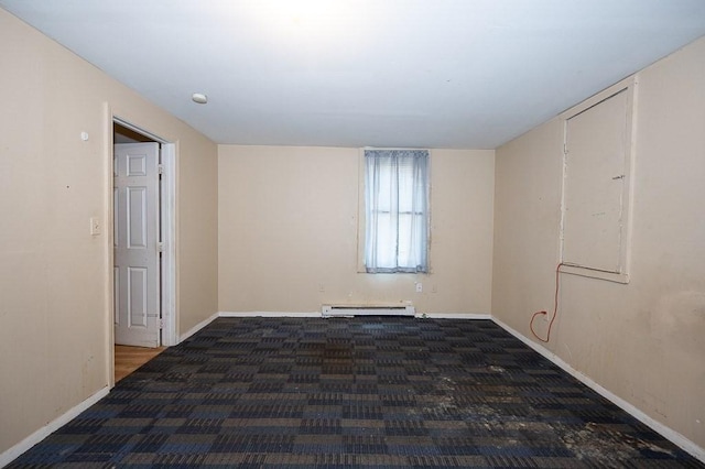 135 Elm St, Southbridge, MA 01550 - empty room featuring a baseboard radiator and carpet floors