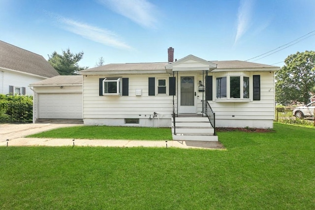 42 Jacob St, Chicopee, MA 01020 - view of front of house featuring a front lawn, a garage, concrete driveway, and a chimney