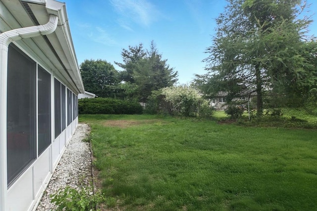 42 Jacob St, Chicopee, MA 01020 - view of green lawn with a sunroom