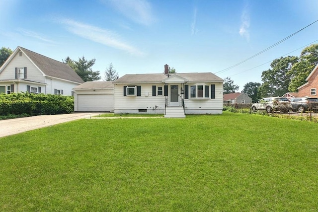 42 Jacob St, Chicopee, MA 01020 - view of front facade with a front yard, a chimney, and entry steps