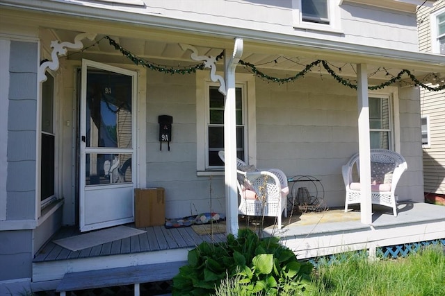 doorway to property featuring a porch
