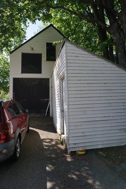 view of outdoor structure featuring a garage