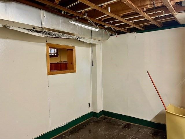 unfinished basement with baseboards