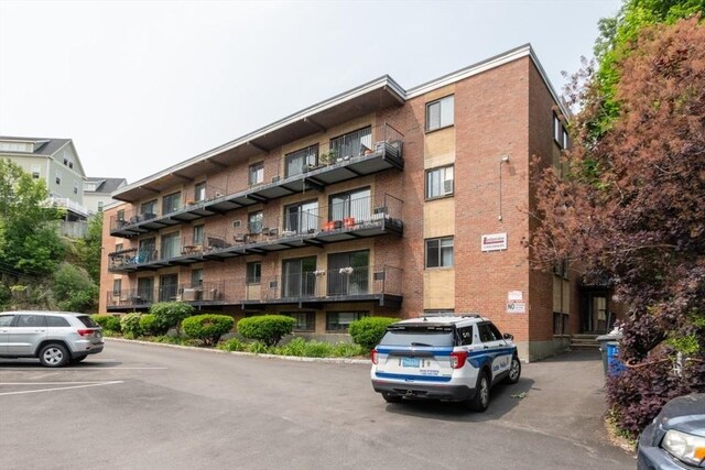 5 Linda Ln Unit 2-2, Boston, MA 02125 - view of apartment building / complex with uncovered parking