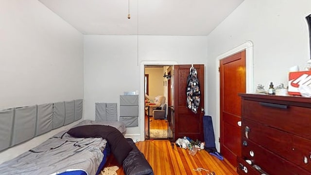 bedroom featuring hardwood / wood-style floors