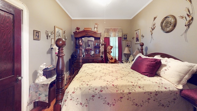 bedroom with crown molding and wood-type flooring