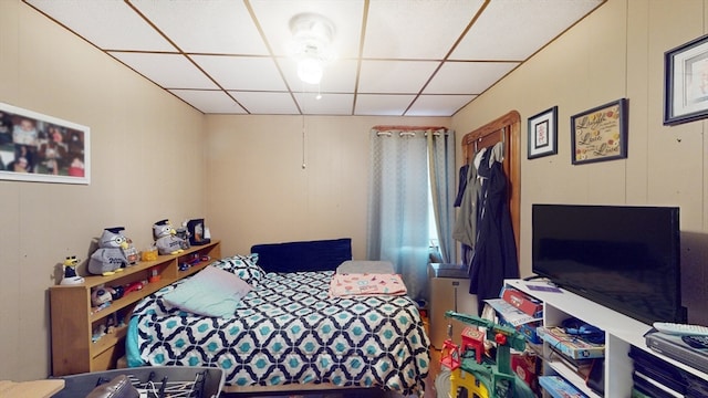 bedroom featuring a paneled ceiling