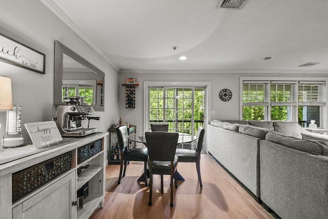 29 Maple St Unit C, Canton, MA 02021 - dining space with crown molding, light wood-style floors, and recessed lighting
