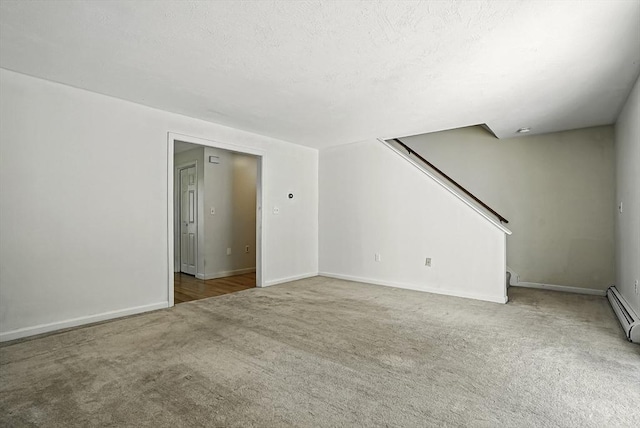 205 Bayberry Hill Ln Unit 205, Leominster, MA 01453 - unfurnished living room with carpet, stairs, and a textured ceiling