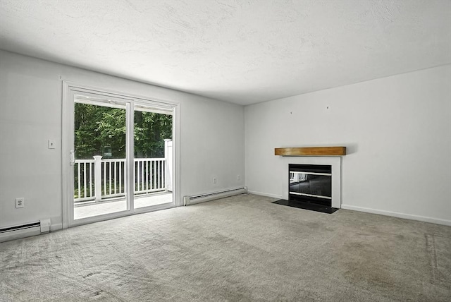 205 Bayberry Hill Ln Unit 205, Leominster, MA 01453 - unfurnished living room featuring a baseboard heating unit, a fireplace with flush hearth, a textured ceiling, and carpet floors