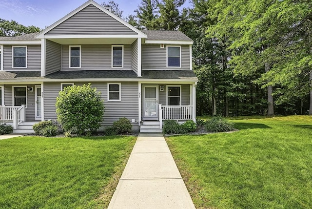 205 Bayberry Hill Ln Unit 205, Leominster, MA 01453 - view of front of house featuring covered porch, roof with shingles, and a front lawn