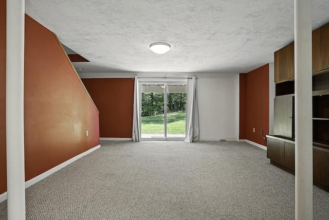 205 Bayberry Hill Ln Unit 205, Leominster, MA 01453 - empty room featuring a textured ceiling and carpet